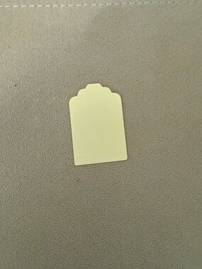 300 Scalloped Top Paper Tag in Pale Yellow